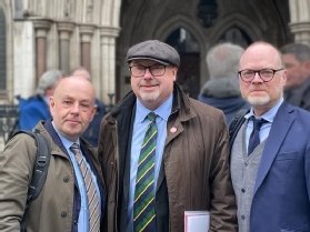 Photo of Barry McCaffrey, Grahame Morris and Trevor Birney outside court